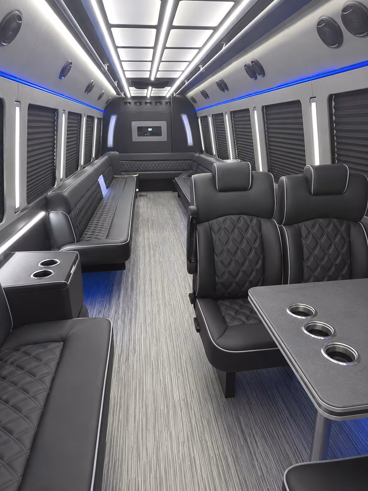 Group beside a Mercedes Sprinter limo in Tulsa